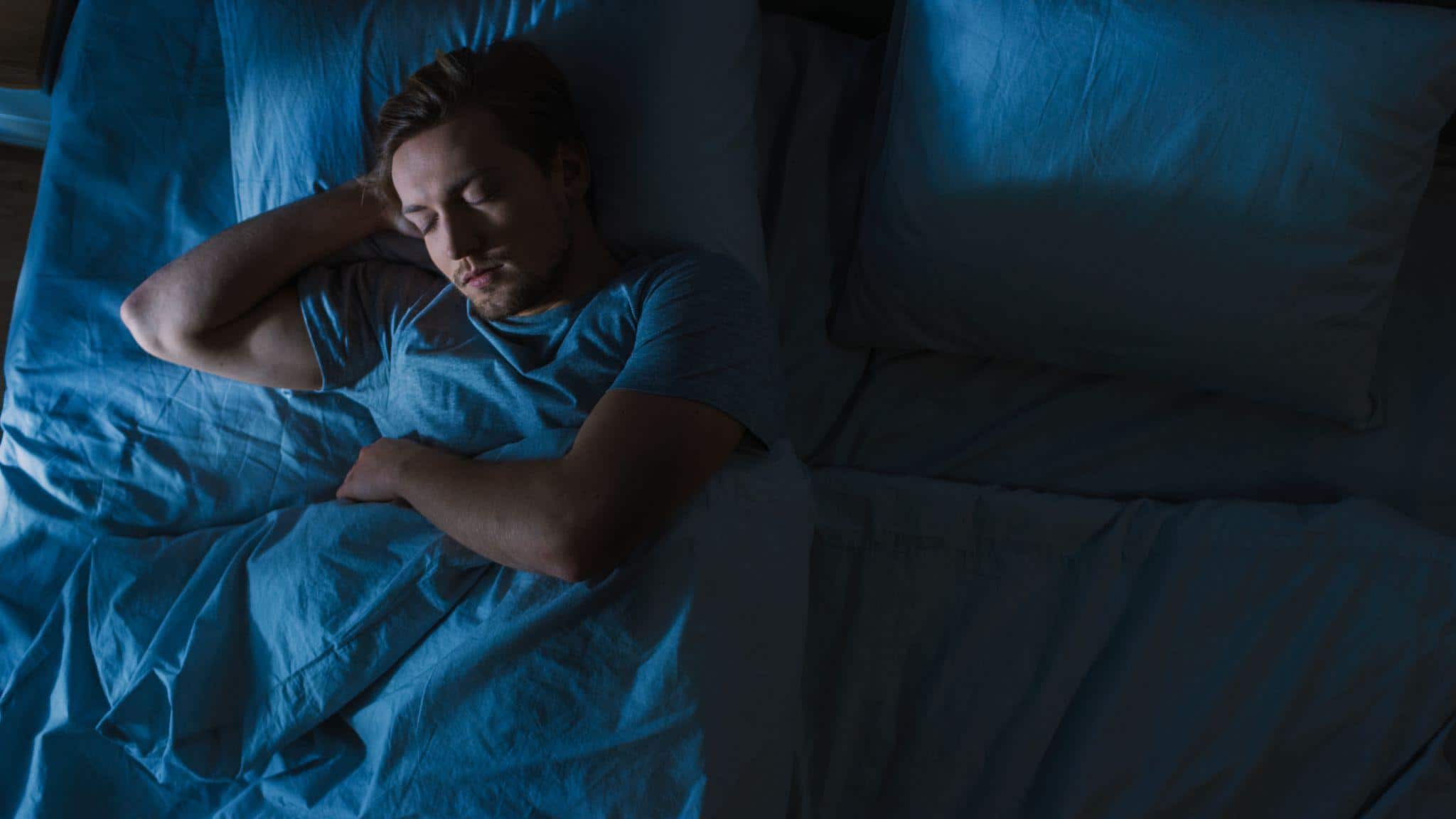 young man sleeping comfortably