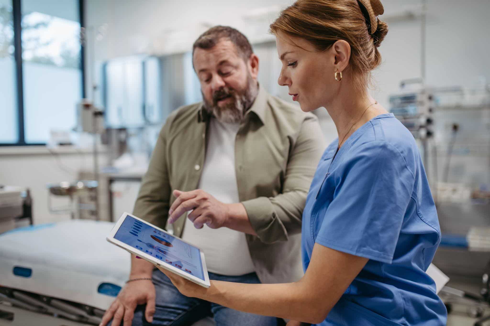 patient learning about his metabolism with his doctor