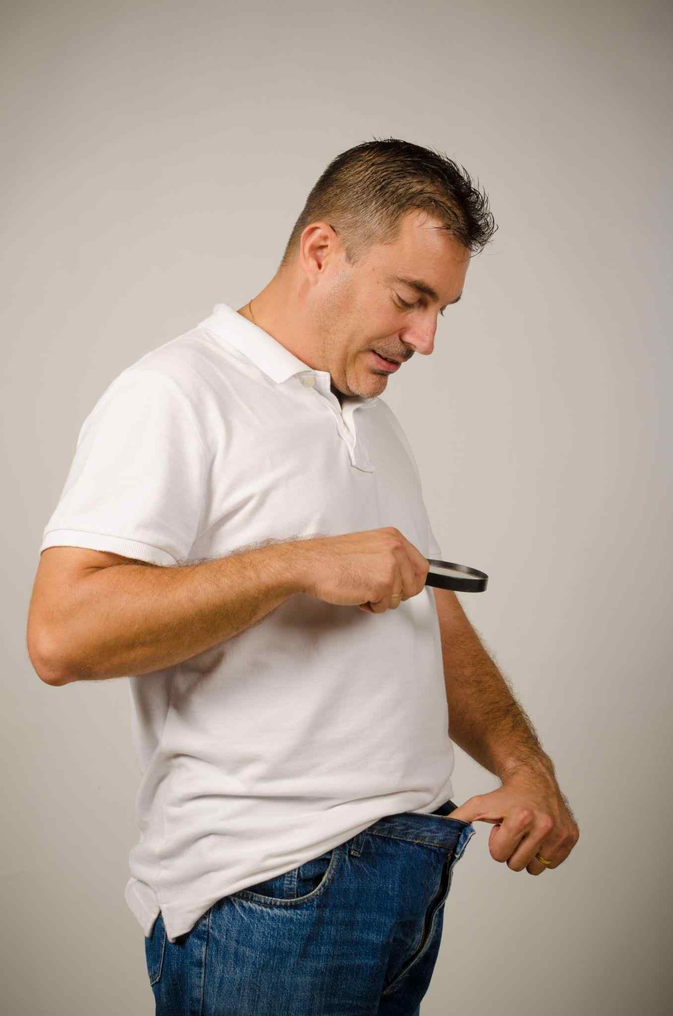 man checking his penis size