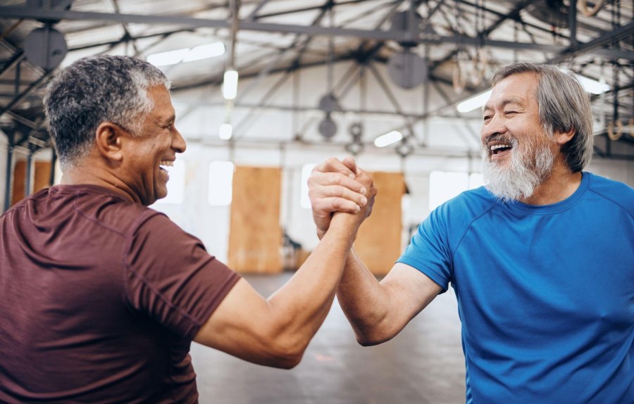 men greeting each other at the gym