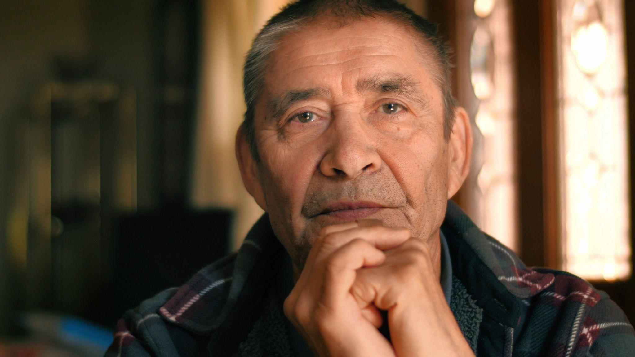 middle-aged man pondering