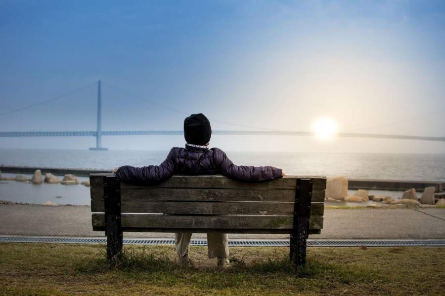 person sitting on a bench