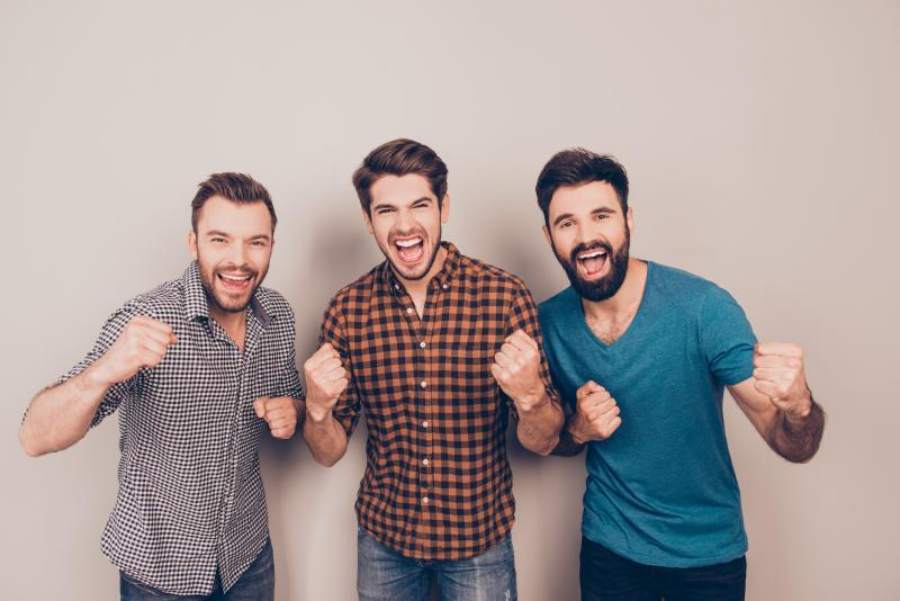 three young friends celebrating