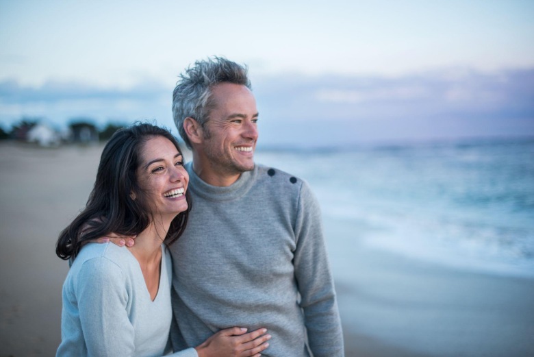 happy couple at the beach