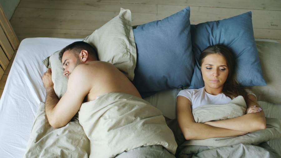 sexually dissatisfied couple in bed