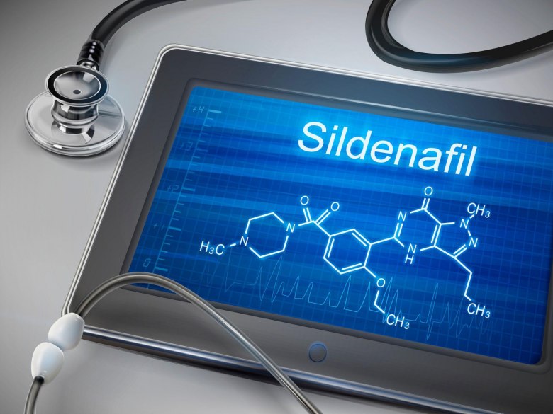 sildenafil organic structure on a tablet next to a stethoscope