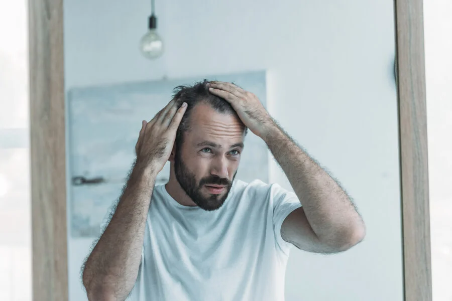 does finasteride reduce testosterone